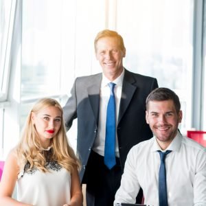 portrait-boss-with-his-two-colleagues-workplace-office